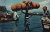 Afrika (Sonstiges) - Afrika - Girl carrying gourds - ca. 2000